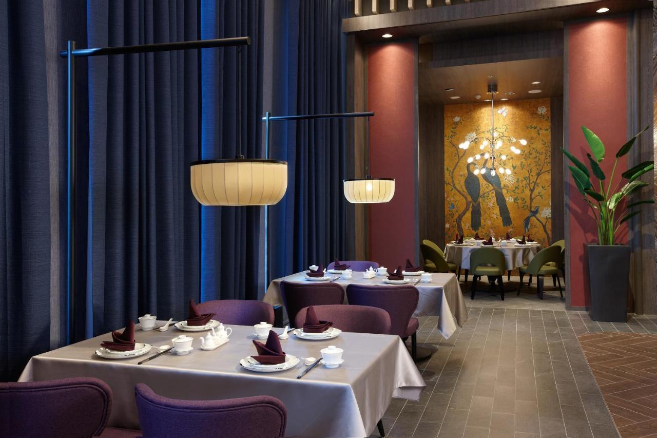 Hotel Cozzi Blu Zhongli Zewnętrze zdjęcie The interior of the restaurant